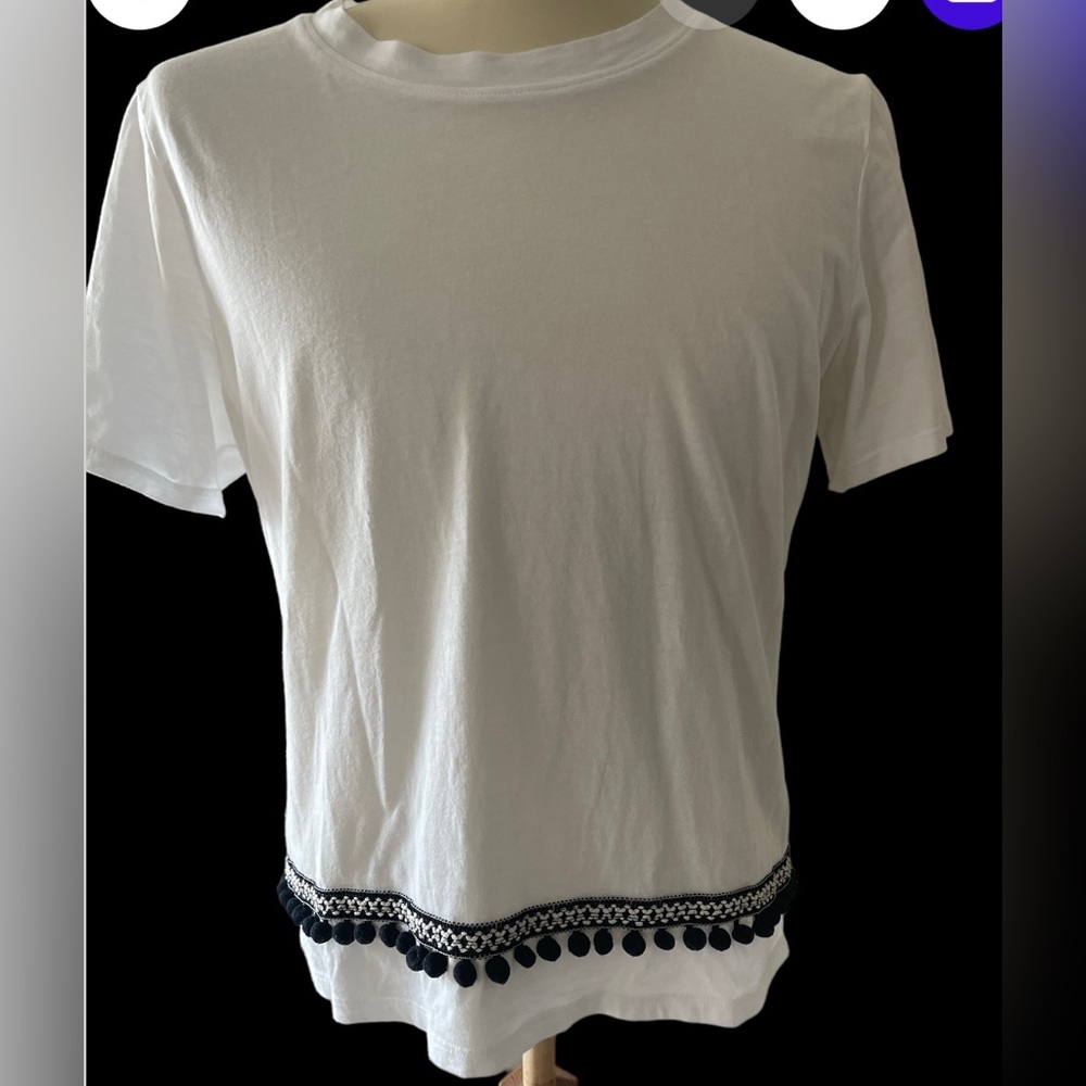 White cotton T-shirt by ONLY with black trim and bobbles at the bottom
